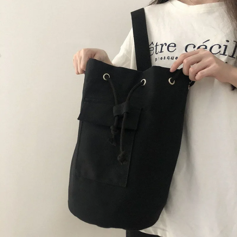 Large capacity bucket bag Korean version Ins early autumn pocket canvas drawstring diagonal shoulder bag for men and women