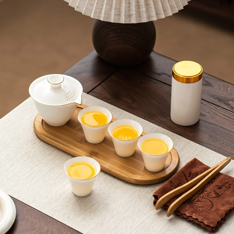 Sheep fat jade porcelain home kung fu tea set, portable teapot and tea caddy for outdoor travel, storage bag for camping