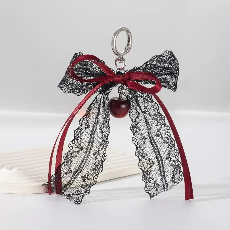 هدية لطيفة على شكل سلسلة مفاتيح لعيد الحب - قوس دانتيل مع سلسلة لؤلؤية وسحر نجمة. إكسسوار حقيبة شريط الباليه للنساء