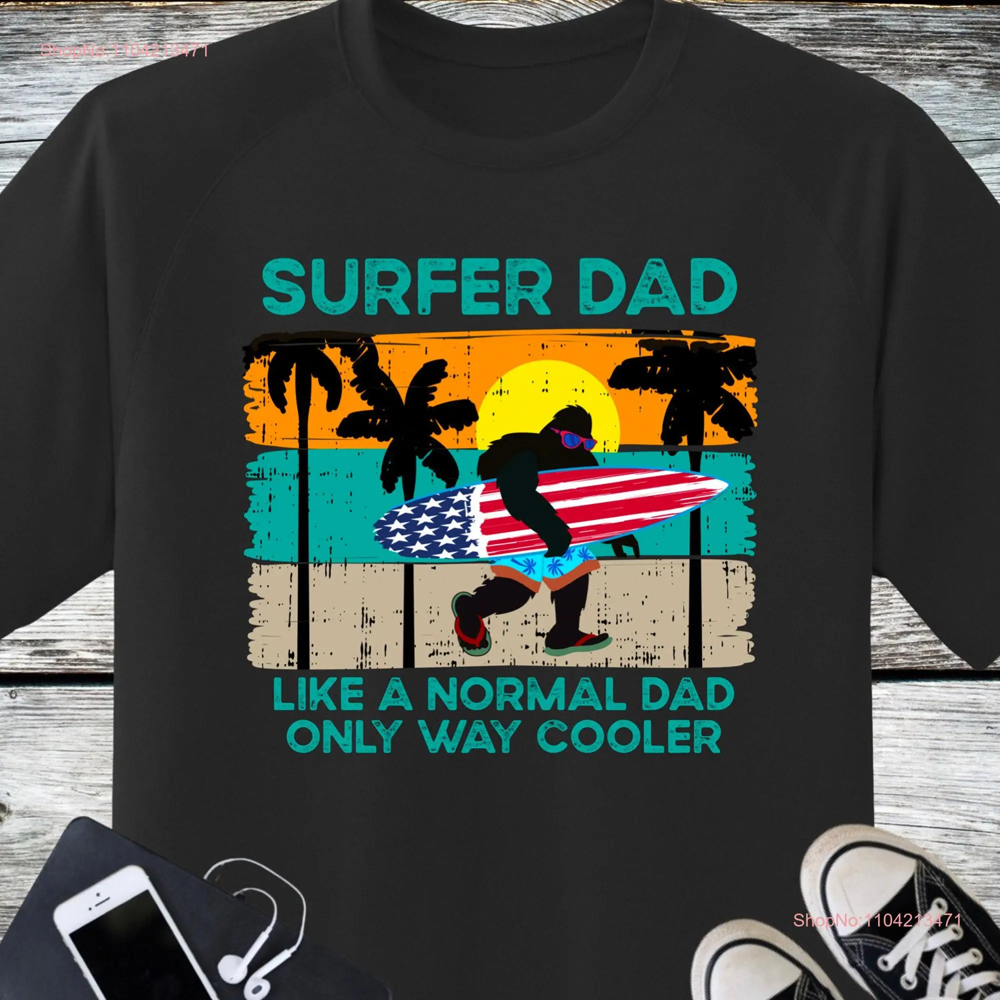 Funny Fathers Day and Patriotic 4th of July Big Foot Beach American Flag Surfing T Shirt long or short sleeves