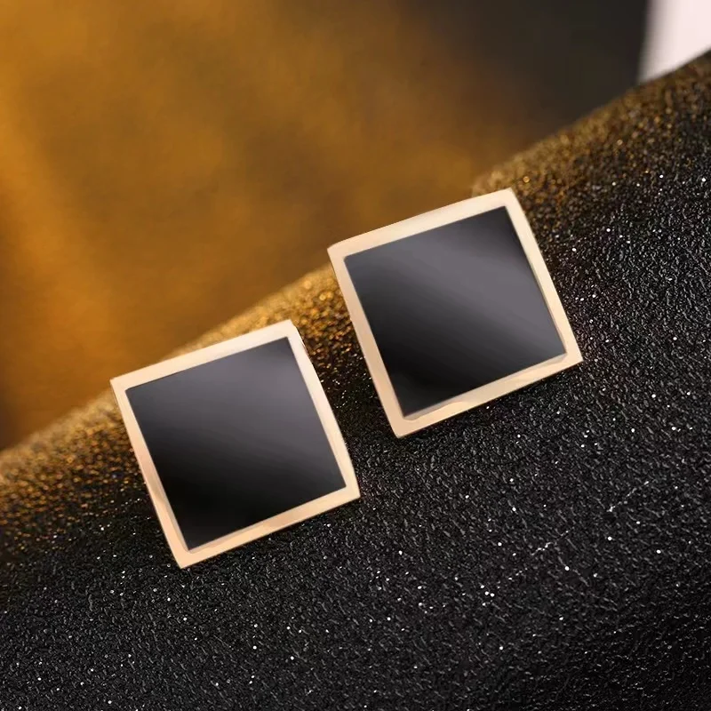 Minimalist arc-shaped black square titanium steel earrings with a versatile and anti allergic temperament