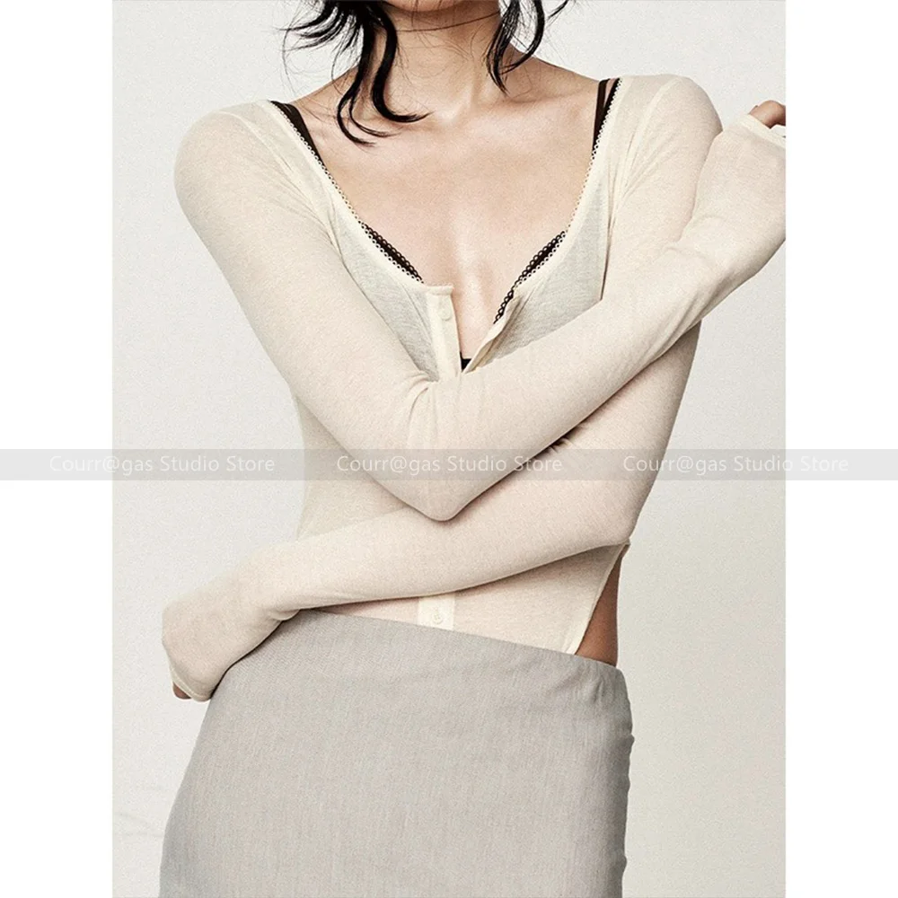 

Niche Sexy Round Neck Curved Waistless Waist Cinching Irregular Long Sleeve Knit Cardigan Top