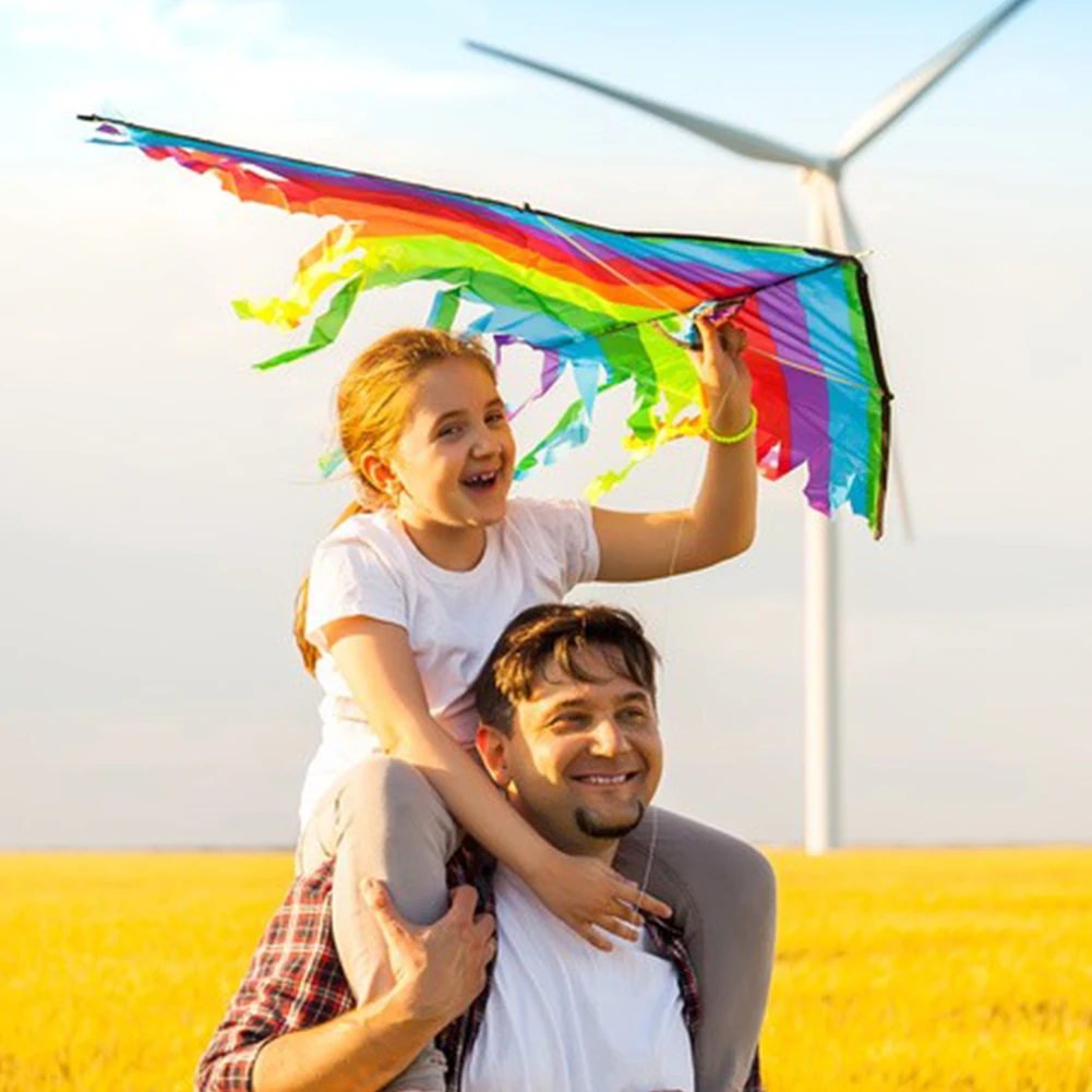 Cometa colorida de arcoíris para niños, cometas de nailon de cola larga para exteriores, juguetes voladores para niños, juguetes de juego para padres e hijos, regalo para cumpleaños