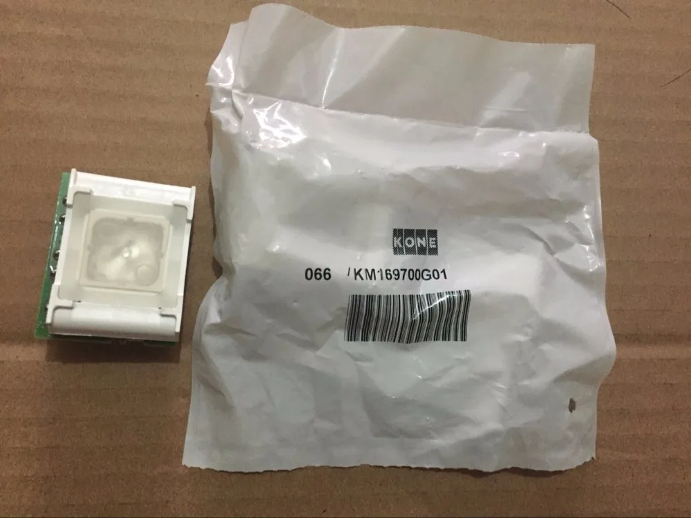 

elevator button KM169700G01, NEW and Original