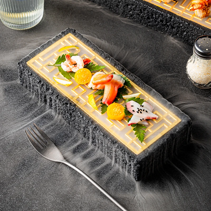 Una revisión de vajilla japonesa de sashimi, gastronomía molecular, vajilla de hielo seco, sushi creativo y golosinas dulces.