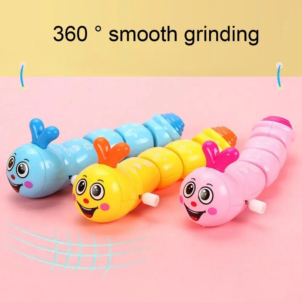 Cartoon Caterpillar Shape Clockwork Toy regali divertenti Jumping Swing Caterpillar Wind Up giocattoli educativi per bambini