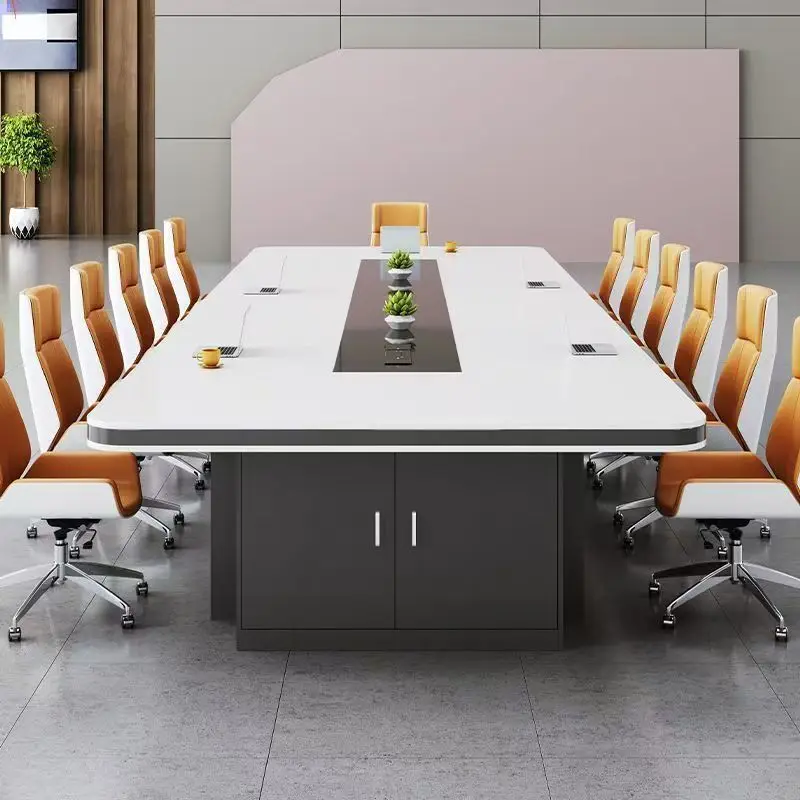 Office training strips negotiate a complete set of large conference tables and chairs