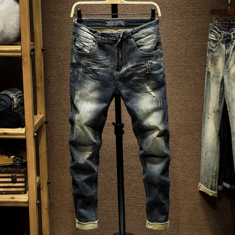 

Retro slim men in jeans stretching Fashionable street men's jeans trousers high quality Spring Autumn