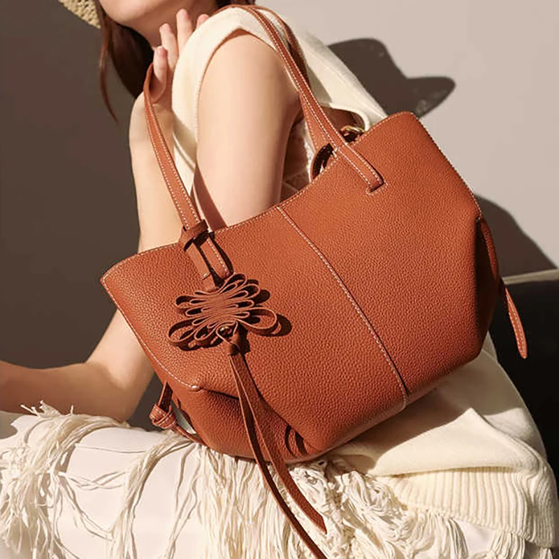 

Cowhide wing bag 2025 new niche design vintage large capacity tote bag genuine leather fashion ladies one-shoulder handbag