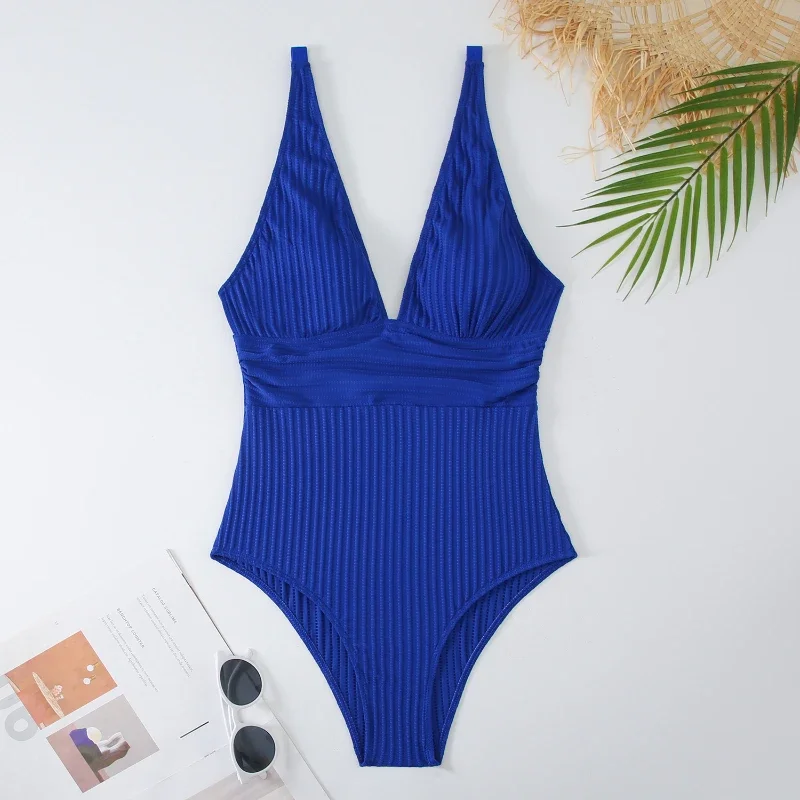 Bañador unicolor de una pieza para mujer, traje de baño sin espalda con realce, ropa de playa, Monokini a bajo precio