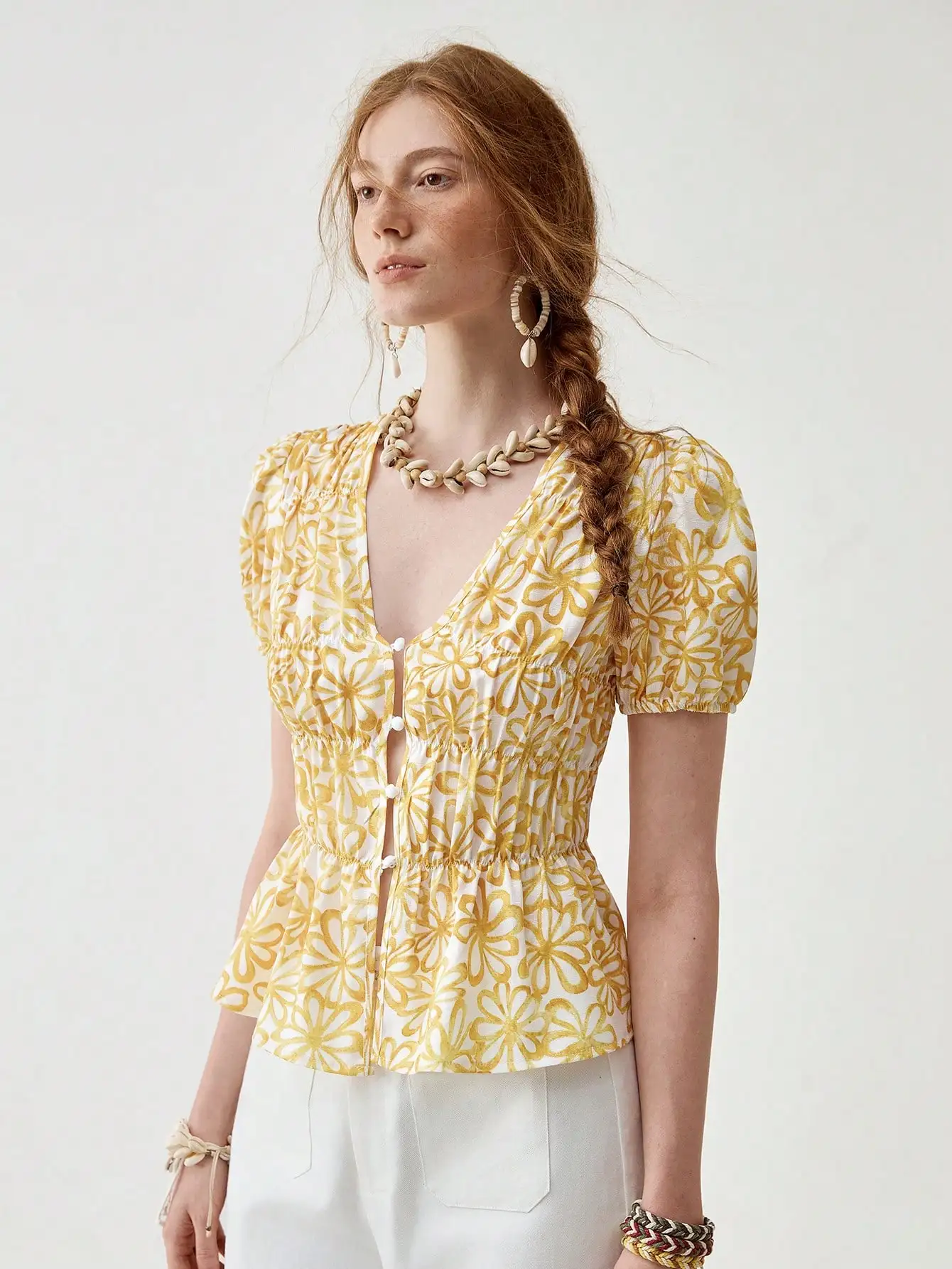 

Printed floral pattern shirt: top with adjustable puffy sleeves and deep V neck