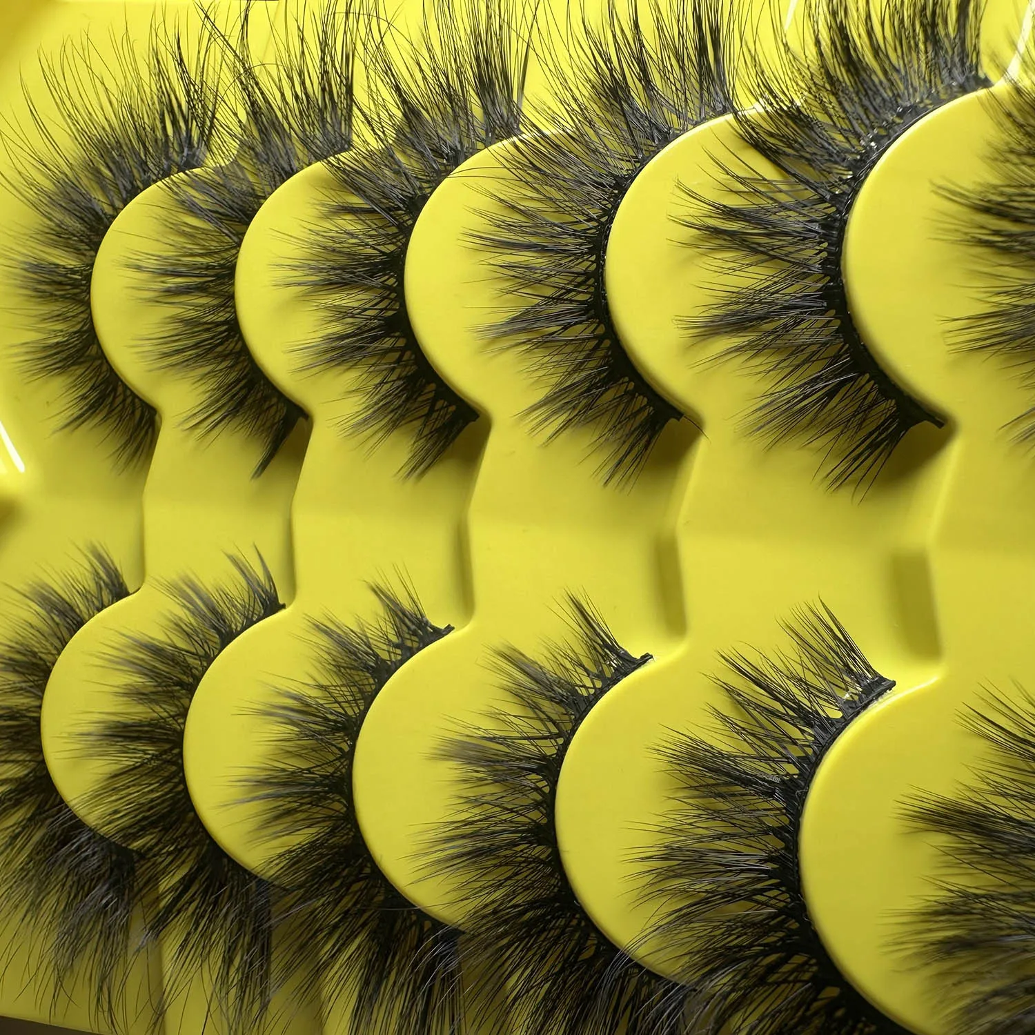 7-piece 3D layered eye shadow with lengthened tail, mixed European/American style, stage makeup, black-themed eyelashes.