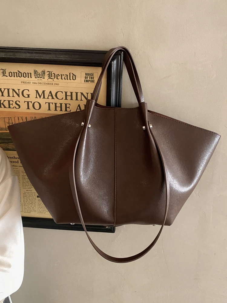 

Large Capaci Women's Tote Bag 2026 New Sle Commuter Bag with Wings Single oulder Bag Casual Simple Sle Soft PU Leather