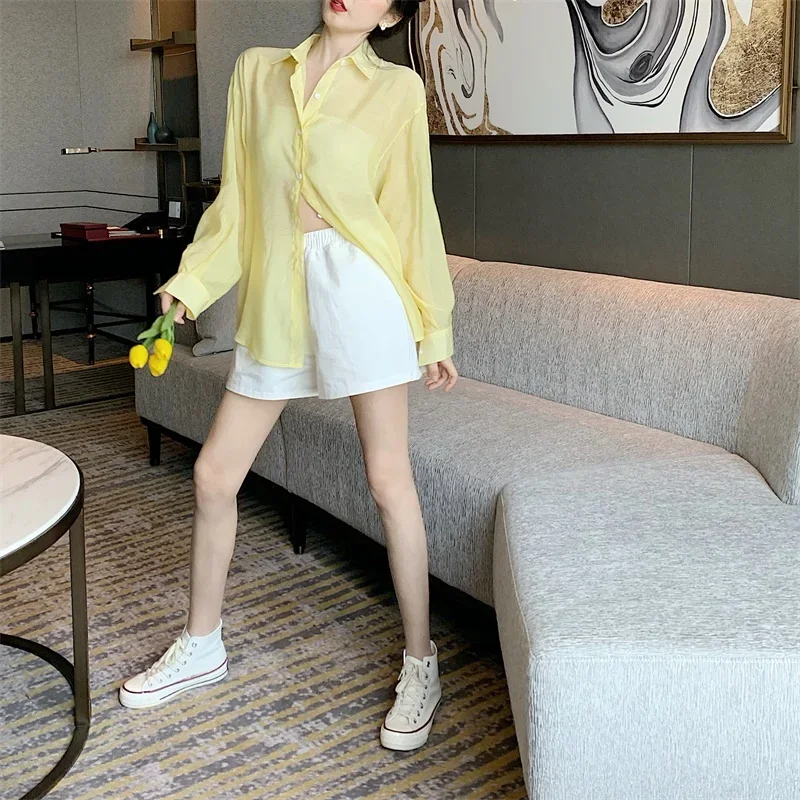 Koszule damskie cienkie letnie odporne na słońce wiązanie z tyłu elegancki design przezroczyste seksowne damskie pojedyncze piersi Casual Holiday Baggy Fit Blusas