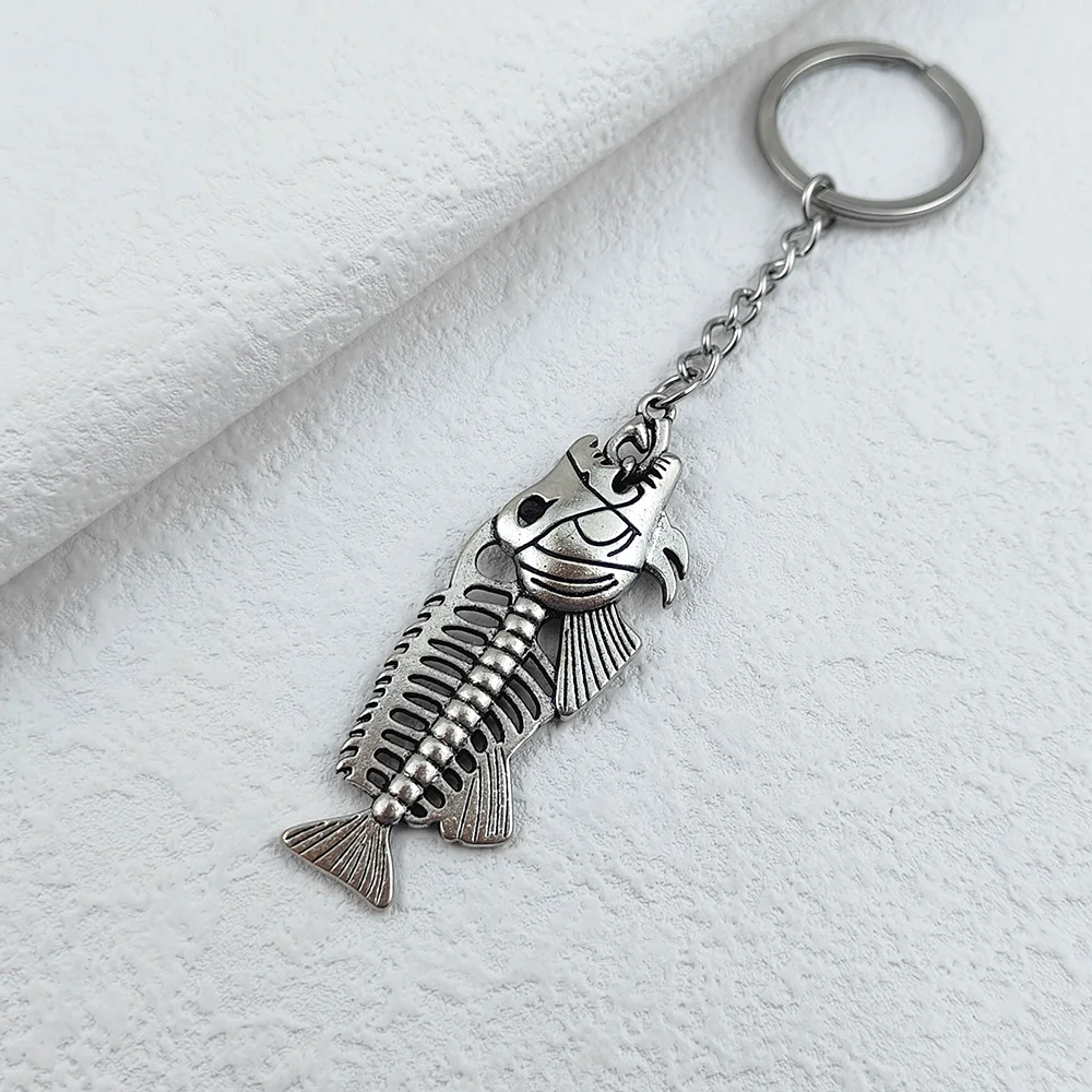 New Women‘s Luxury Alloy Keychain Hollow Out Fishbone Pattern Long Pendant Key Chain for Men Women Car Keyring Gifts Wholesale image 4