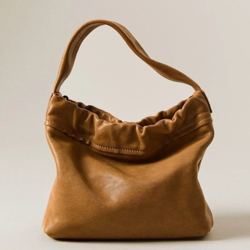 Cloud-shaped handbag made of sheepskin, casual and versatile, suitable for carrying by hand, shoulder, or crossbody for women