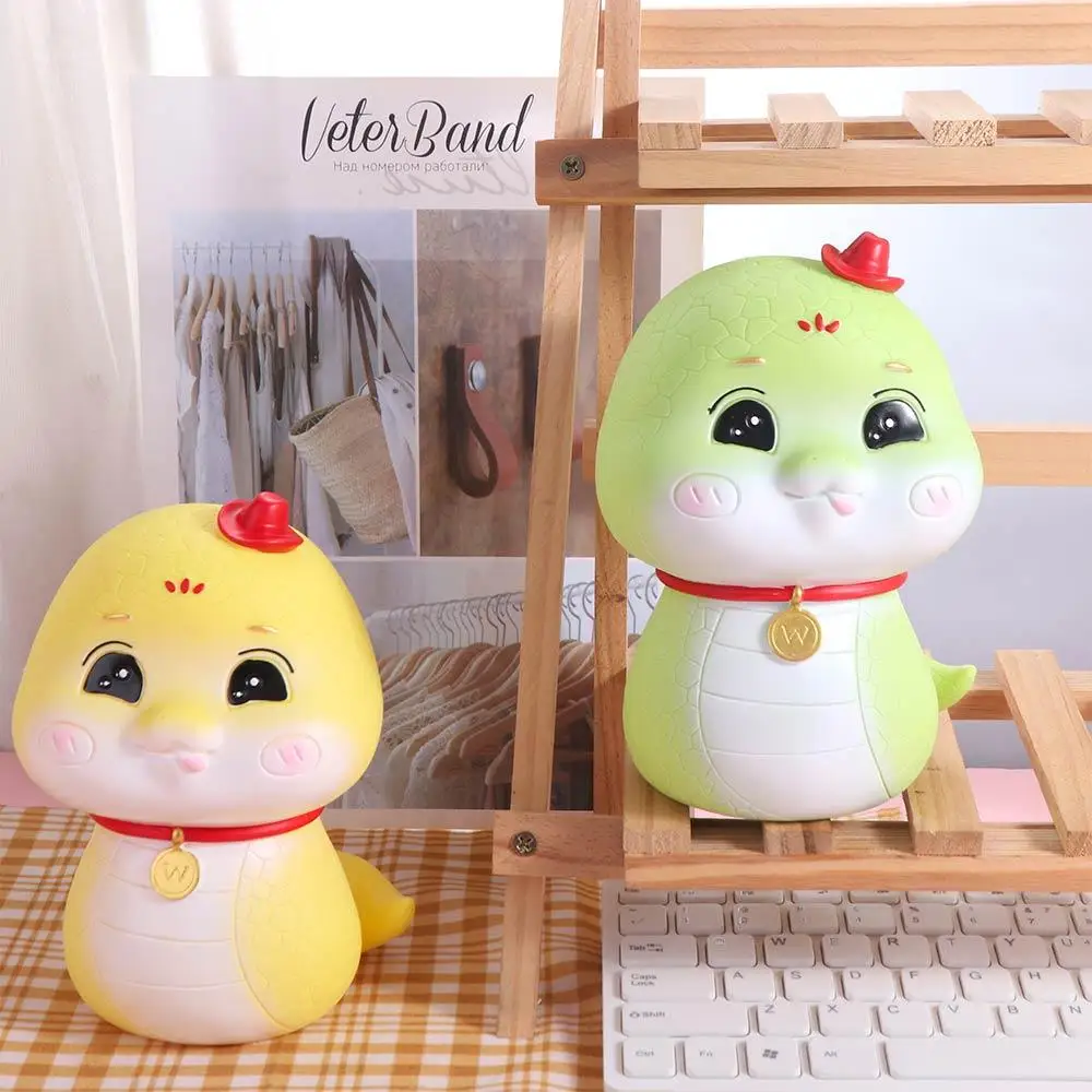 大容量の干支蛇の貯金箱、お金の節約、干支蛇の貯金箱、漫画の携帯用蛇のコイン収納ボックス