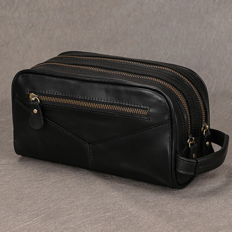 Nowa designerska męska torba Stroage do prania podróżnych Torby ze sprzęgłem Mężczyźni Kobiety Torby do makijażu Prawdziwa skóra Trwałe sprzęgła Duże