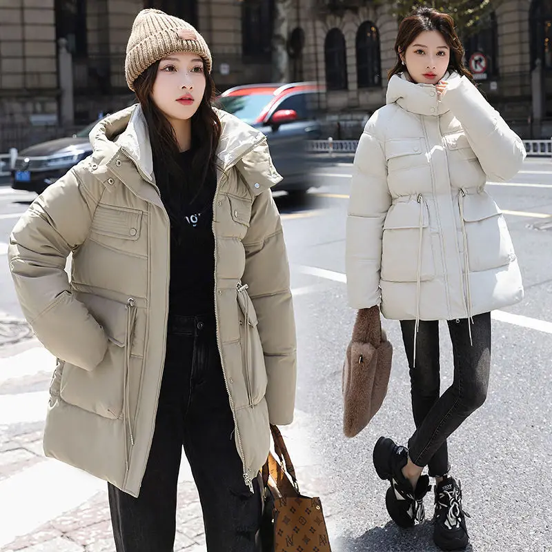 معطف شتوي نسائي جاكيت دافئ من القطن سترات جديدة متوسطة الطول مبطنة بالقطن معطف نسائي كوري فضفاض بقلنسوة