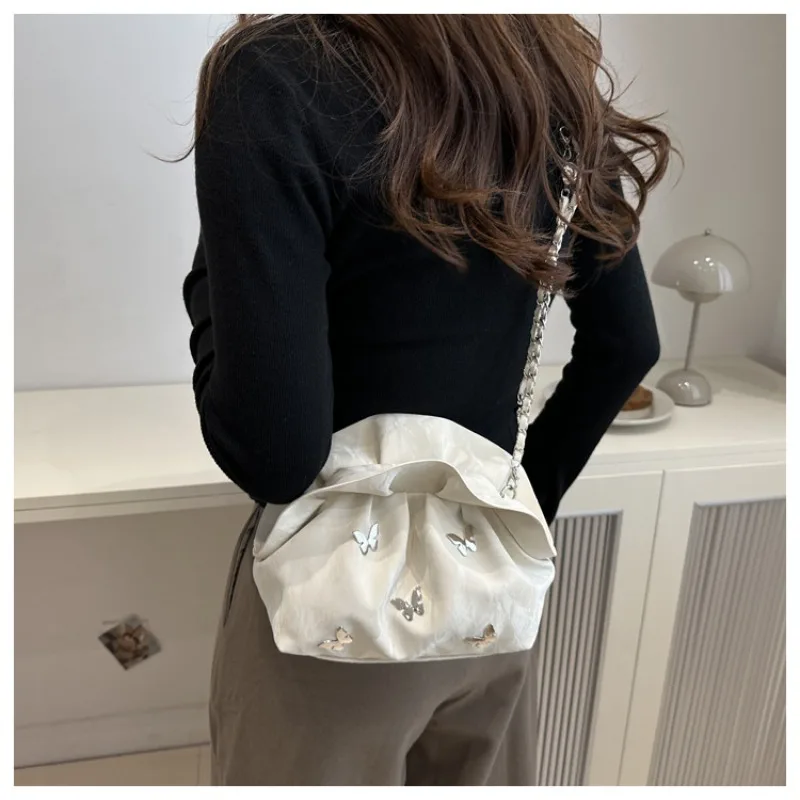 

2025 Korean version of the trend of pure color bucket bag simple fashion aesthetic personality pleated crossbody bags