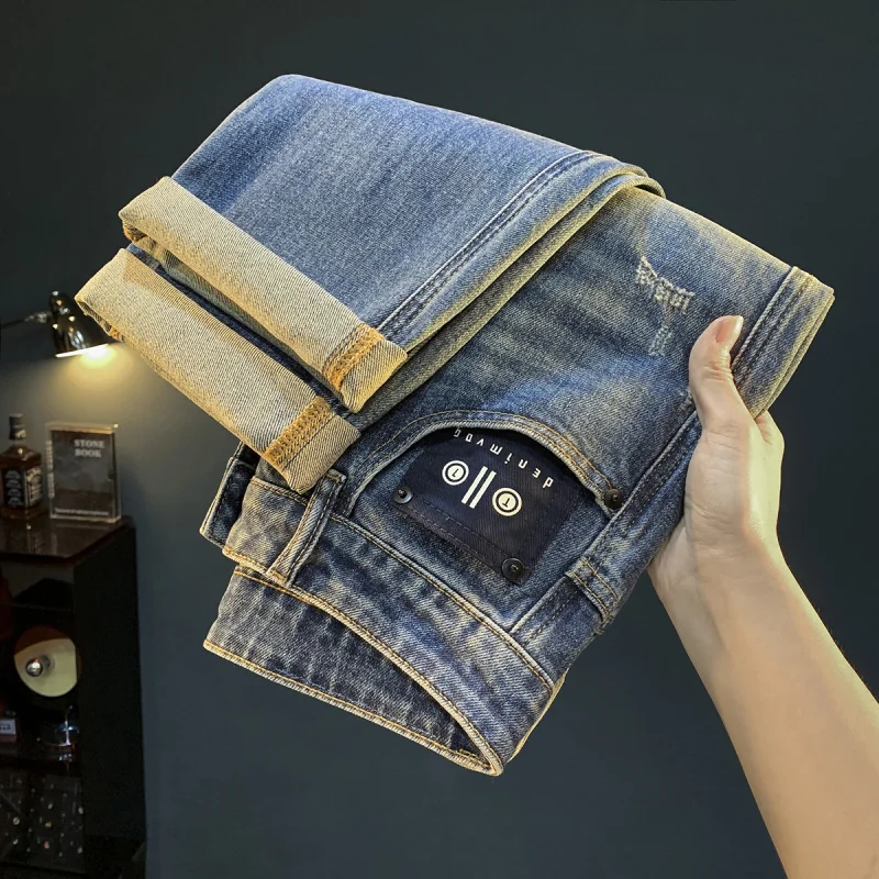 Jeans larghi taglie forti da uomo, design a gamba dritta lavato retrò, pantaloni da uomo di nuova tendenza della moda autunnale 2025
