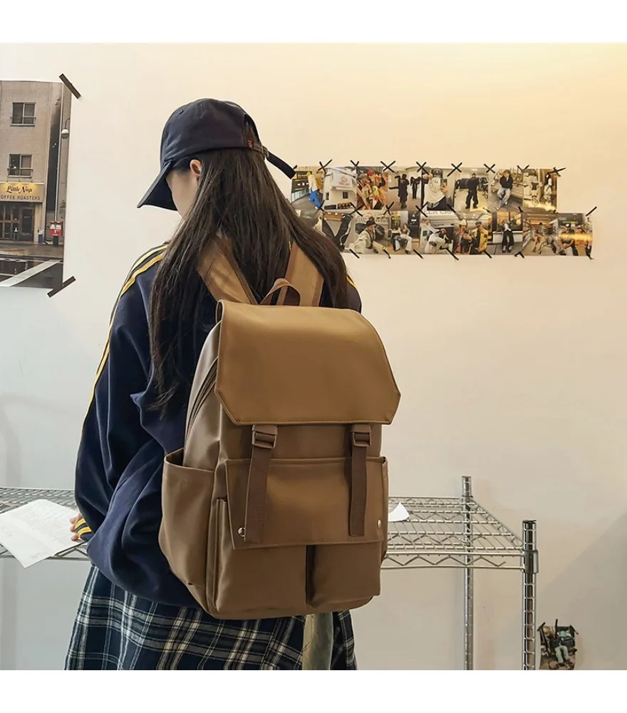 Simple casual PU women's bag large capacity double pocket couple backpack large capacity commuting versatile women's schoolbag