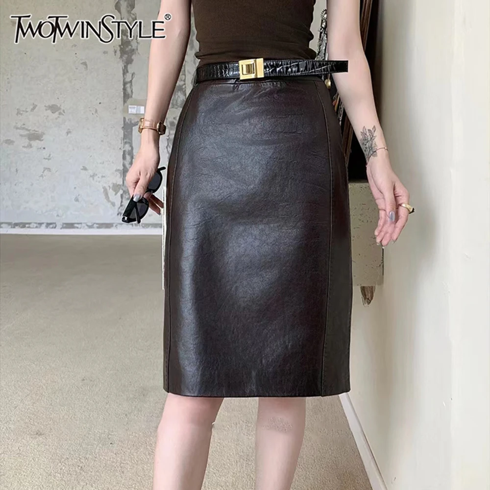 

TWOTWINSTYLE Solid Slimming Leather Skirt For Women High Waist Bodycon Minimalist Knee Length Skirts Female Fashion Clothes New