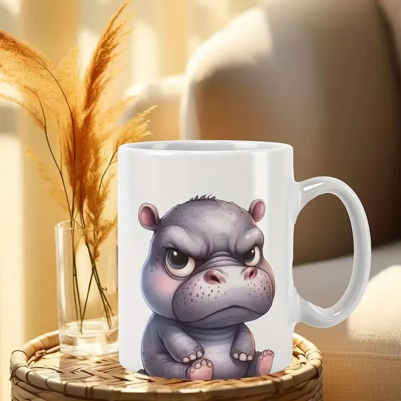 1 Piece of 11-Ounce Ceramic Mug with Handle, Featuring a Grumpy Hippo Animal Design Printed on One Side This Unique Gift Is Suitable for Both Hot and Cold Beverages, Perfect for Summer and Winter Drinking, and Also Makes a Great Gift for Occasions Such as Halloween, Christmas, Weddings, Birthdays, Etc.