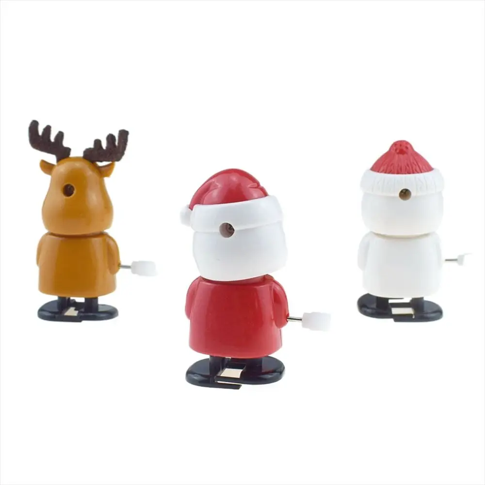 Jouets à remonter de la série de Noël, jouets de saut, wapiti, bonhomme de neige, horloge, dessin animé, secouer la tête, père Noël, marche, beurre