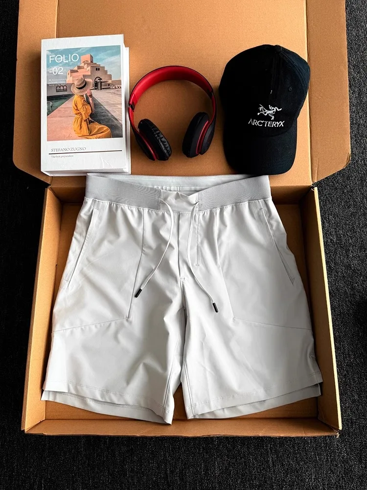 American Sle Qui Dry Fitn ort Sport orts Pria Musim Panas Tipis Es Sutra Bernapas CleanFit Longgar Tabung Lurus Lima orts