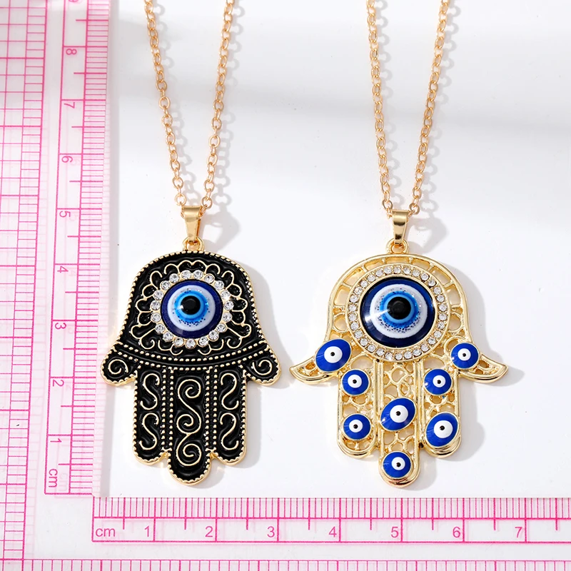 Enamel Retro Turkey Eye Hamsa Hand Necklace Women Men New Hollow Ethnic Zircon Blue Evil Eye Fatima Hand Sweater Chians Jewelry