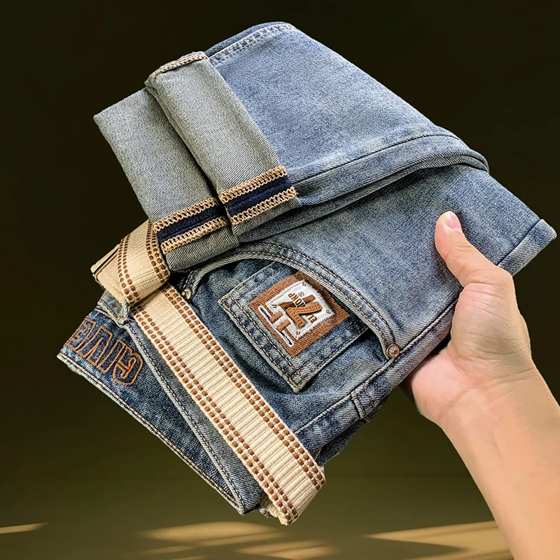 

2025 летние новые мужские джинсы, модные облегающие брюки с вышитым принтом, эластичные повседневные брюки высокого класса на небольшую ногу