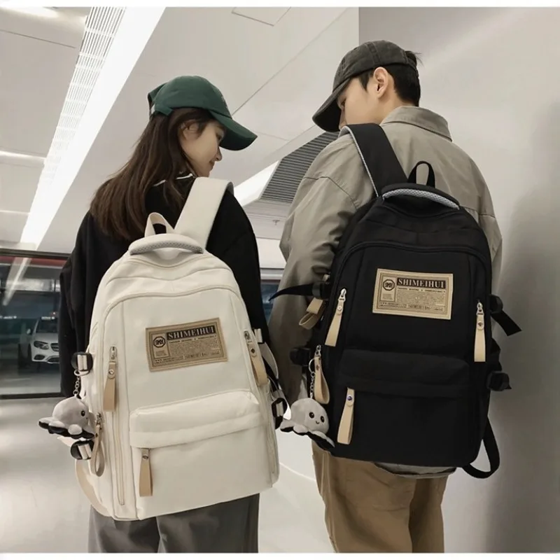 Fashion trend backpack backpack for men and women junior high school high school student bag large capacity korean version of th