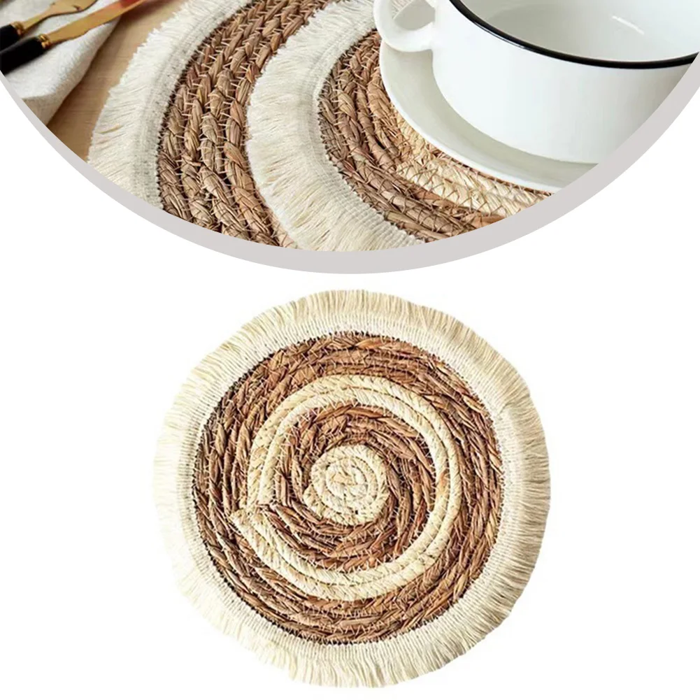 

Chic Round Mats with Elegant Tassels Designed to Protect Surfaces While Adding a Touch of Style to Your Table Setting