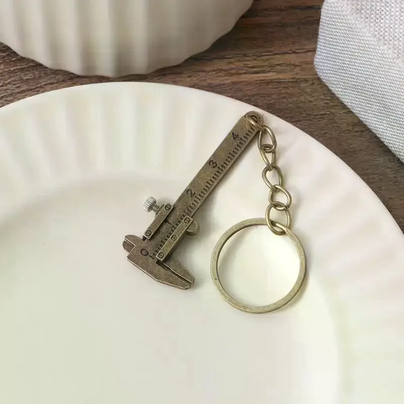 Portable Mini Vernier Caliper Keychain Metal Ruler Car: Movable Model Keyring Gift