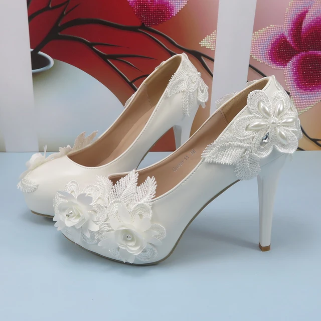 Zapatos blancos de mujer altos sale