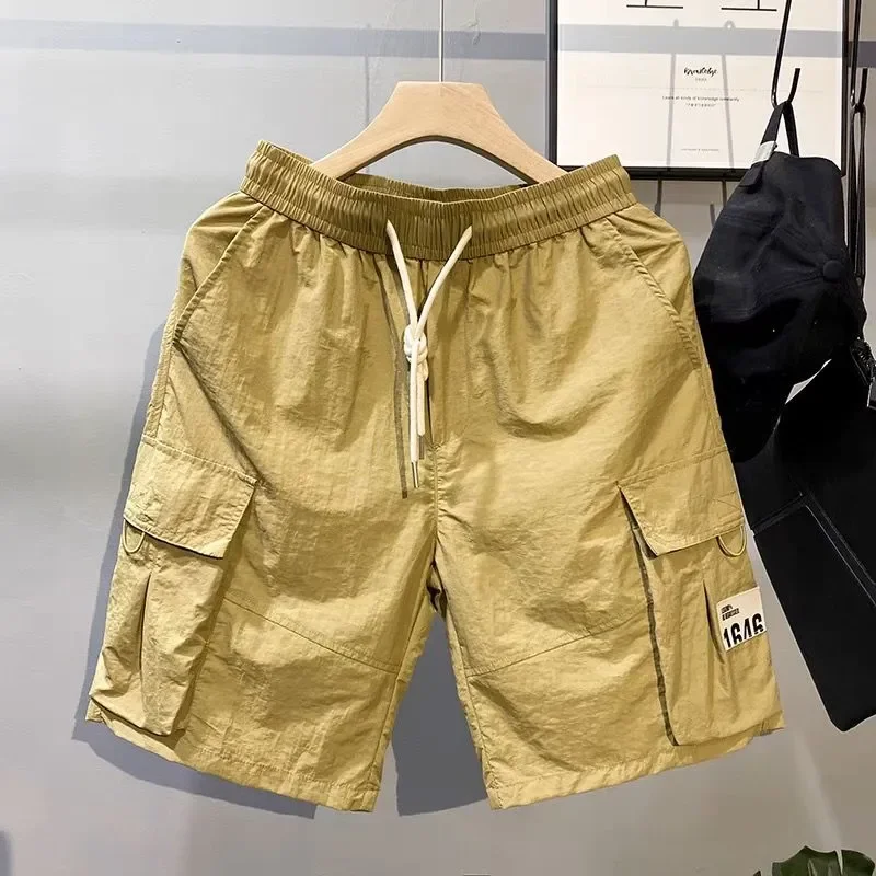 

Повседневные мужские шорты-карго с завязками на талии и множеством карманов для повседневной носки, летний стиль, свободный крой, удобные для активного отдыха.