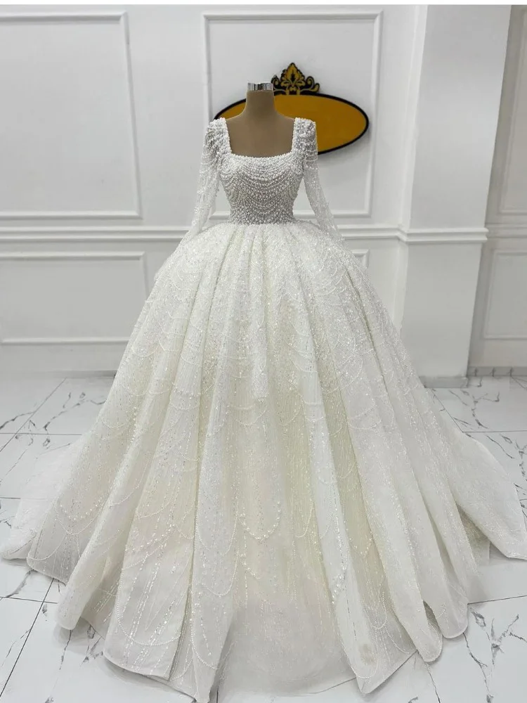 

Luxury Square Neck Wedding Dress Dubai Beaded Pearls Long Sleeves Princess Sparkly Tulle Bridal Gown African Vestido De Novia