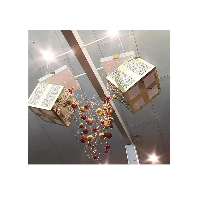 Shopping mall hangs Christmas and lights gift boxes for decoration