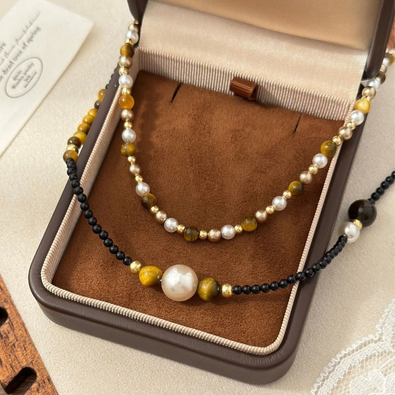 

Роскошное ожерелье из бусин черного оникса и тигрового глаза для женщин | Цепочка на ключицы из натурального камня, многослойная, дизайнерская, эффектное украшение