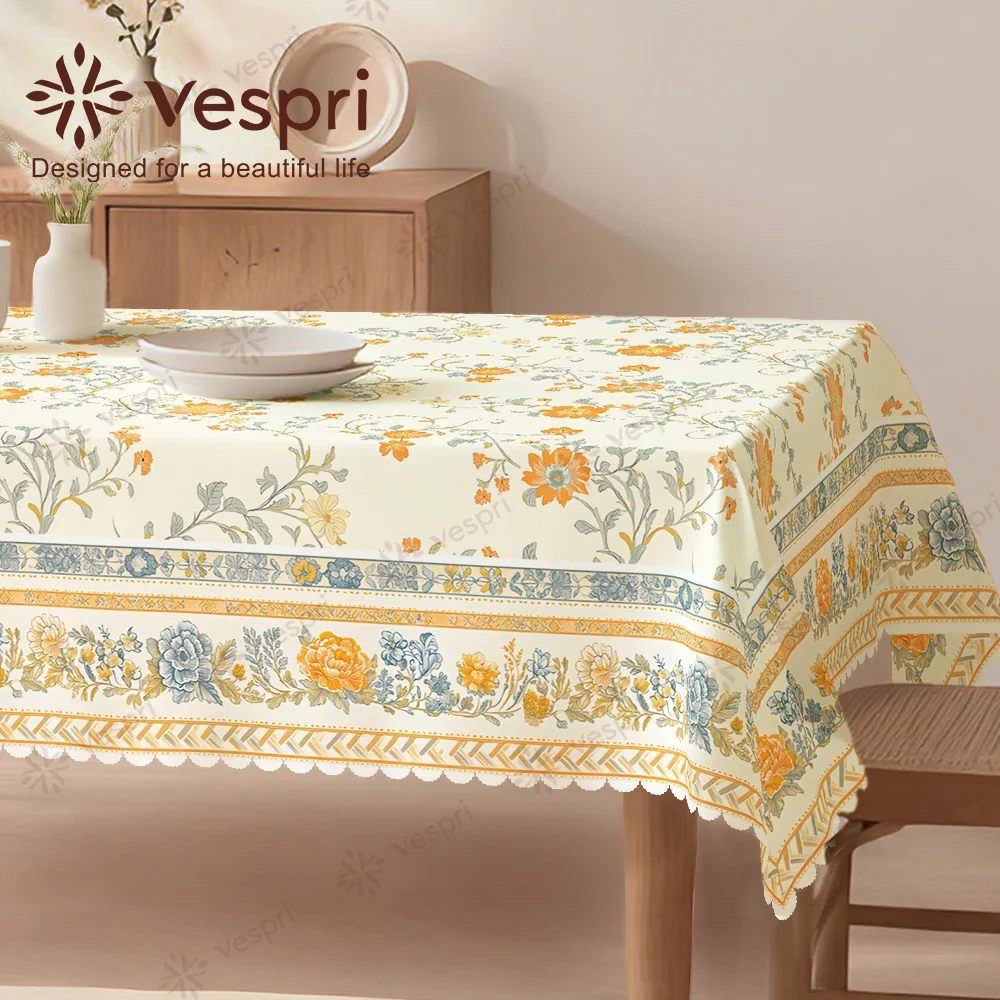 Vespri Spring Tablecloth, with yellow and white decorations, featuring flowers.zyc