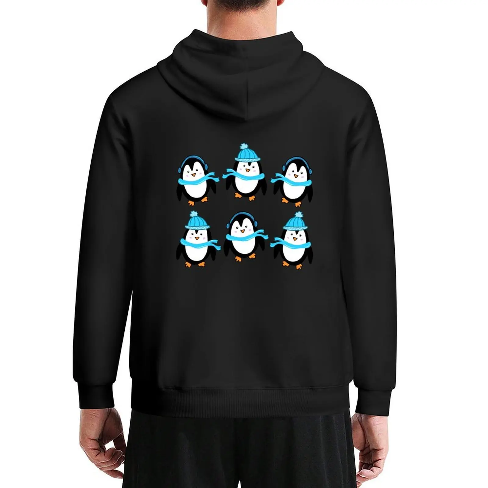 

Festive Winter Penguins with Blue Scarves and Hats on a Dark Blue Backdrop, made by EndlessEmporium Hoodie