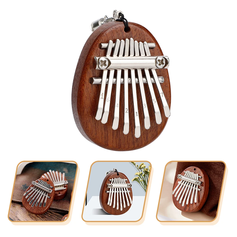 

Piano Hand Held Thumb Finger Oval Solid Wood Kalimba Musical Instrument