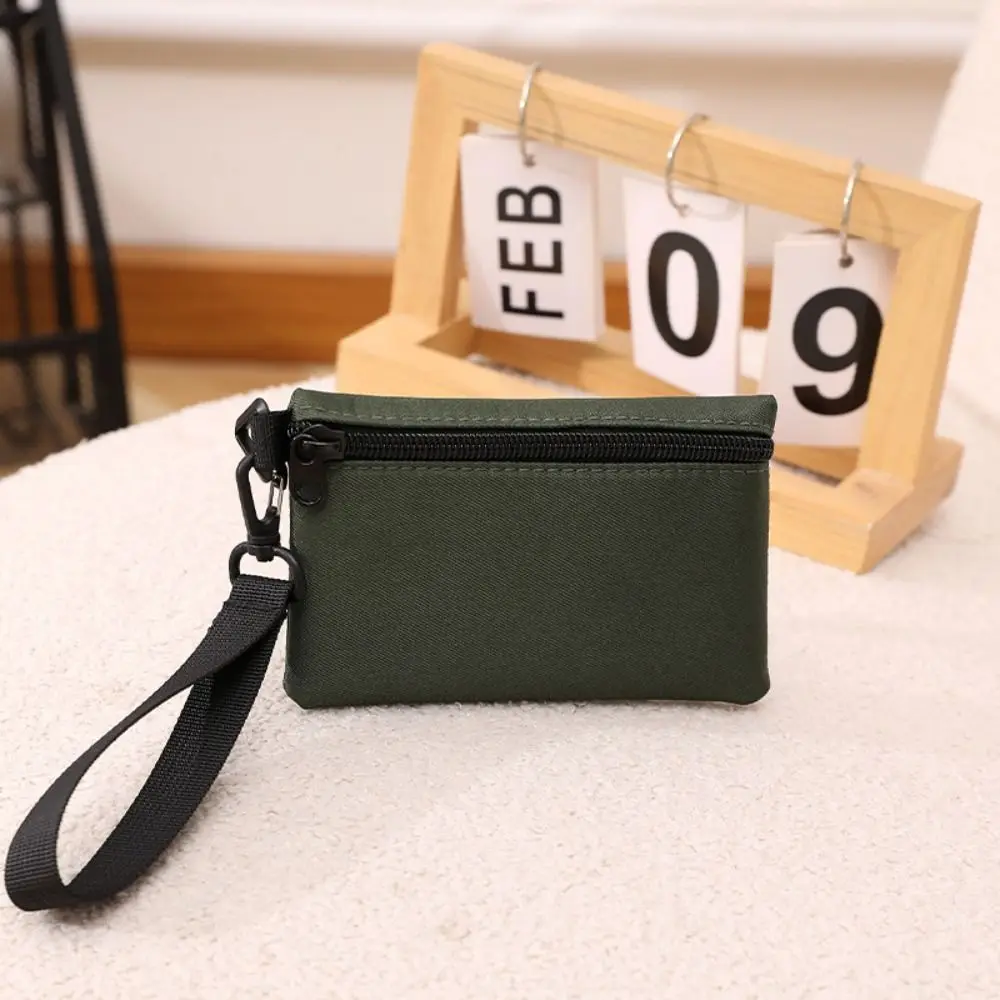 

Casual Korean Style Ox Cloth Coin Purse Wrist Bag with Lanyard Small Item Bag Coin Purse Card Bag Card Storage Bag Men