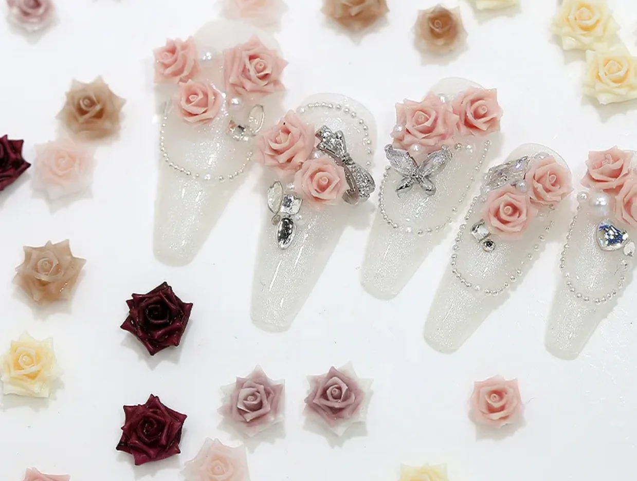

100PCS Or 1Box Vibrant Assorted Rose Camellia Bow Rhinestone Nail Art Charms Mixed Colors for Manicure Decorations