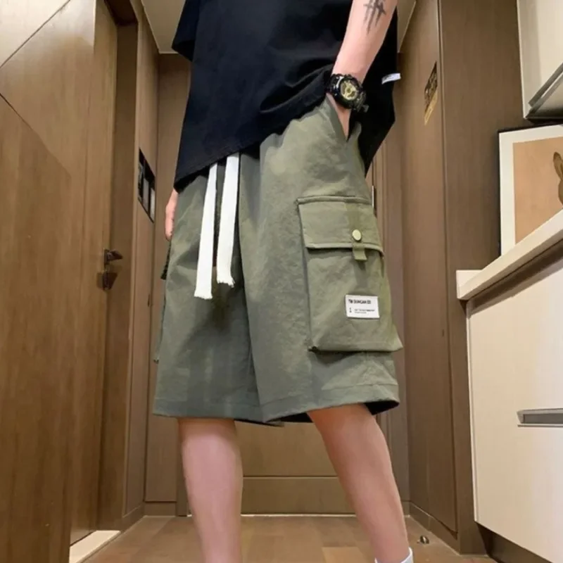 Com bolsos baggy sólido longo cintura elástica tamanho grande solto largo metade bermuda draw string masculino calças curtas oversize y2k harajuku