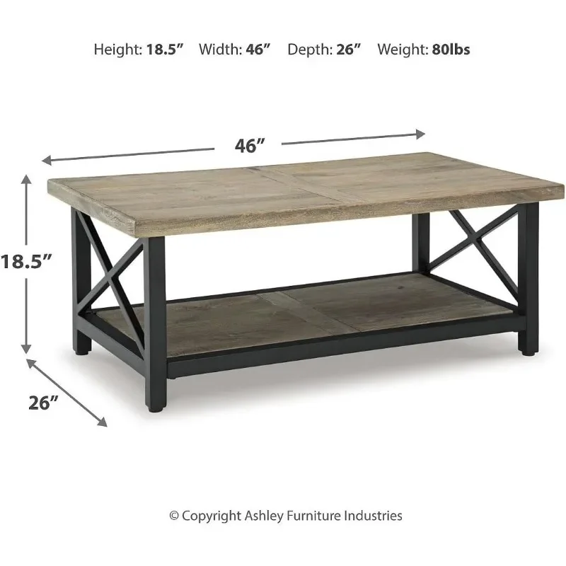 La table basse, fabriquée en bois de manguier et en métal, avec une étagère inférieure ouverte, a une finition marron clair