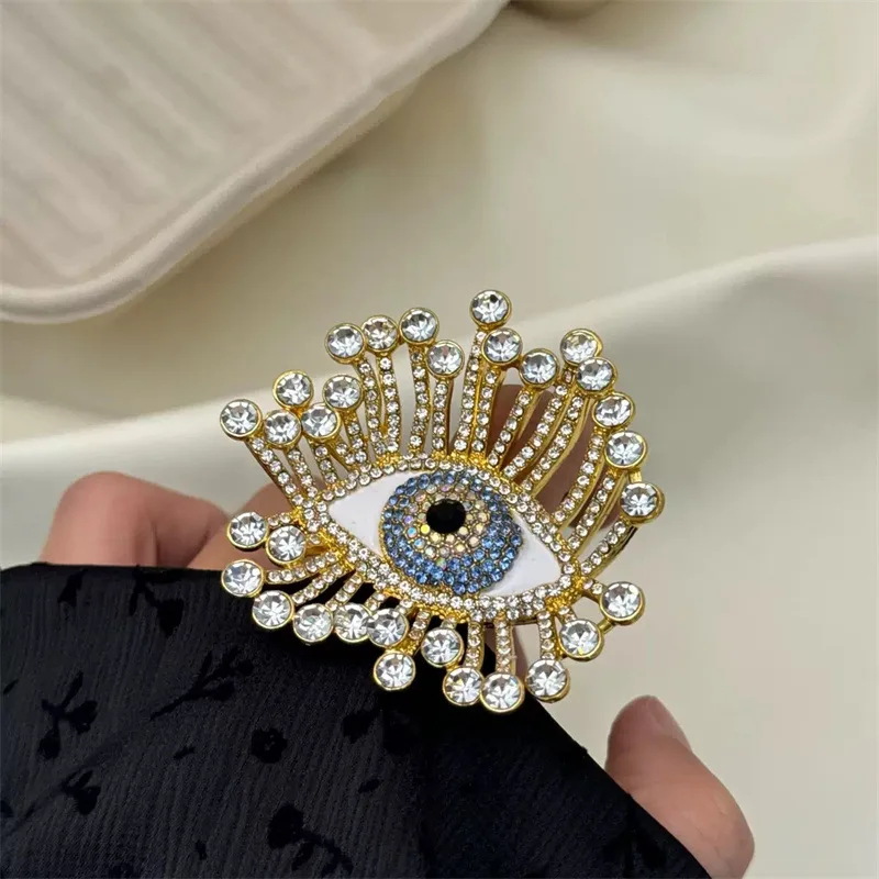 European and American Retro Flashing Sun Flower Eye Woman Ring Exaggerated Eyes Open Ring