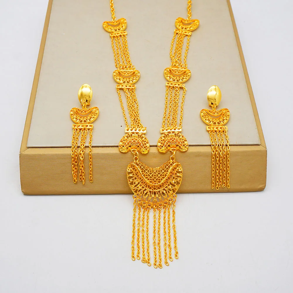 

Necklace/Earrings (Geometric Hollow Tassel) Women 24K Gold, AU999 | Hammered meteorite prism with raised diamond-tassel facets.