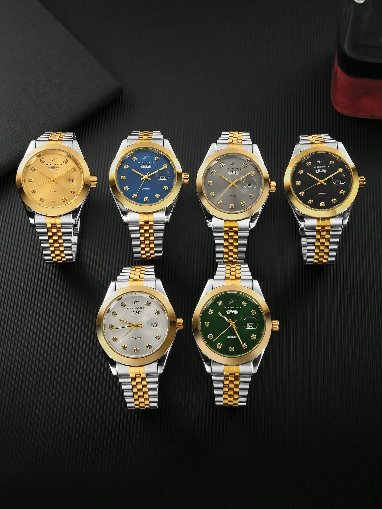 

Мужские кварцевые часы с двухцветным золотисто-серебристым ремешком, круглым циферблатом и индикацией дня недели и даты.